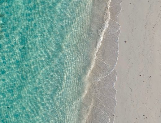 Sandy beach and clear water in Grand Bahama